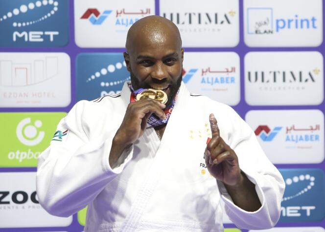 Teddy Riner poses with his gold medal after he beats Inal Tasoev, INA, during their men's +100kg final judo match at the World Judo Championships in Doha (Qatar), on Saturday, May 13, 2023. 
