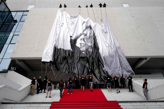 Poster for the 76th edition of the Cannes Film Festival is put up on the facade of the Palais des Festivals on the Croisette.  May 14, 2023.