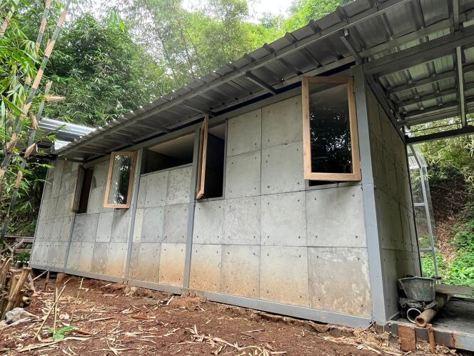 A full-scale housing prototype, built by the team of researchers based at Japan's Kitakyushu University, in late 2022, Indonesia.  Waste diapers are used for the walls and floor.