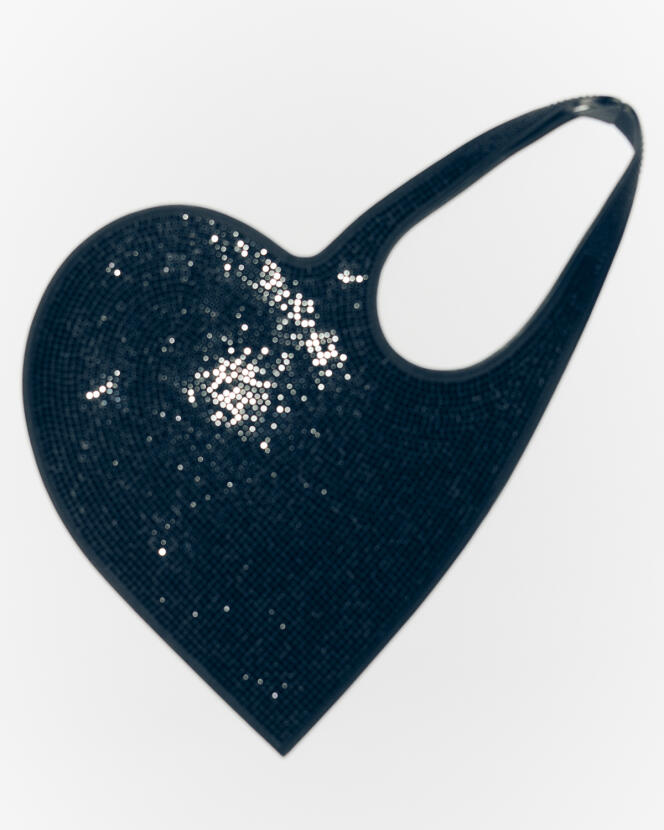 Mini heart tote bag in cotton, polyurethane and rhinestones, Coperni, €620.  coperniparis.com