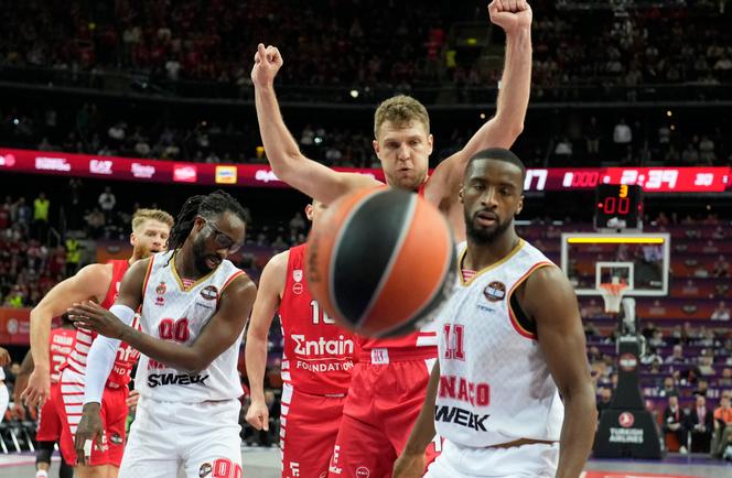 Olympiakos strong winger Aleksandar Vezenkov (in red) against Monegasque players on May 19 in Kaunas, Lithuania.