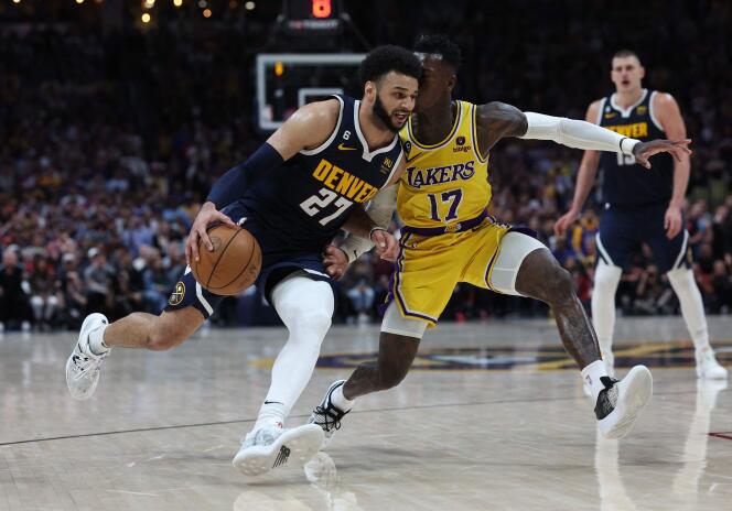 Jamal Murray (left) faces off against Dennis Schröder of the Los Angeles Lakers during Game 2 of the Western Conference Finals in Denver, Colorado on May 18, 2023. 