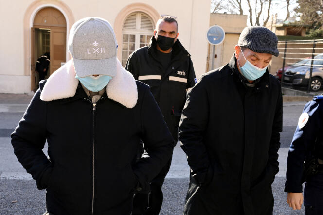 Lionel Guedj and his father, Carnot Guedj, dentists accused of fraud and dental mutilation, on the first day of their first trial, in Marseille, February 28, 2022. 