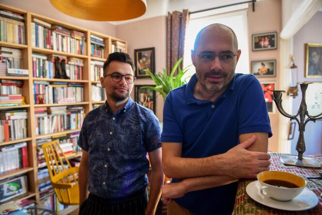 Victor Ciobotaru (L) and his partner Florin Buhuceanu initiated proceedings against Romania for refusing to recognize their civil union. Photo taken in Bucharest on September 20, 2018.