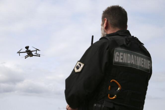 A gendarme uses a drone in Corsica, during confinement, March 21, 2020.