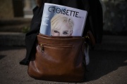A magazine cover in a bag in front of the Palais des Festivals in Cannes on May 24, 2023.
