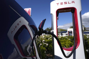 A Tesla auto charges in Westlake, California, on May 10, 2023.