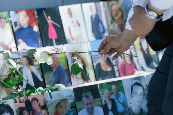 In front of the memorial to the victims of the 14 July 2016 attack in Nice on 14 July 2021.