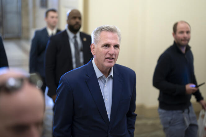 Speaker of the House Kevin McCarthy, R-Calif., is escorted by his security detail as he arrives to talk to reporters about the debt limit negotiations, at the Capitol in Washington, on May 26, 2023. 