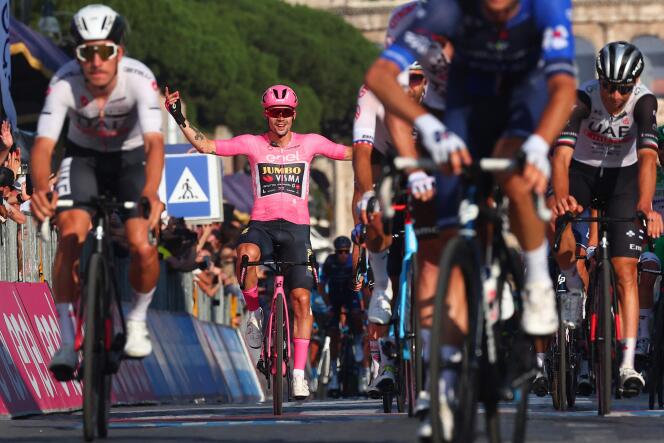 Leader of the general classification, Slovenian Primoz Roglic (back left) celebrates his victory at the finish line of the last stage of the Giro, in Rome, on May 28, 2023. 