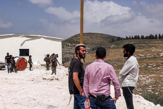 Los colonos israelíes asaltan un sitio en construcción à l'ancien avant-poste de Homesh (Cisjordania), el 29 de mayo de 2023.
