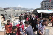 Distribution of water to Syrian refugees in a camp in Hatay (southern Turkey), May 30, 2023.