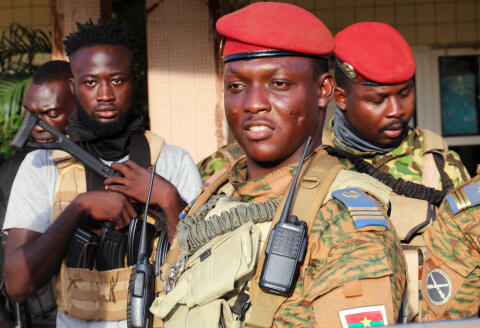 FILE PHOTO: Burkina Faso's new military leader Ibrahim Traore is escorted by soldiers in Ouagadougou, Burkina Faso October 2, 2022. REUTERS/Vincent Bado/File Photo