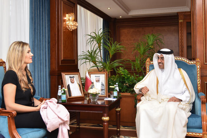 Gulf Emirate Minister of Labor Ali bin Samikh Al-Marri (R) and European Parliament Vice-President Eva Kail, in Doha on October 31, 2022.