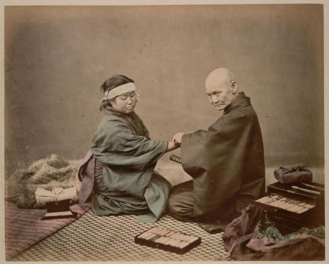 “Doctor taking the pulse of his patient, by Beato Felice (1832-1909).  Photograph taken from the album “Views and Costumes of Japan” (1877-1880).