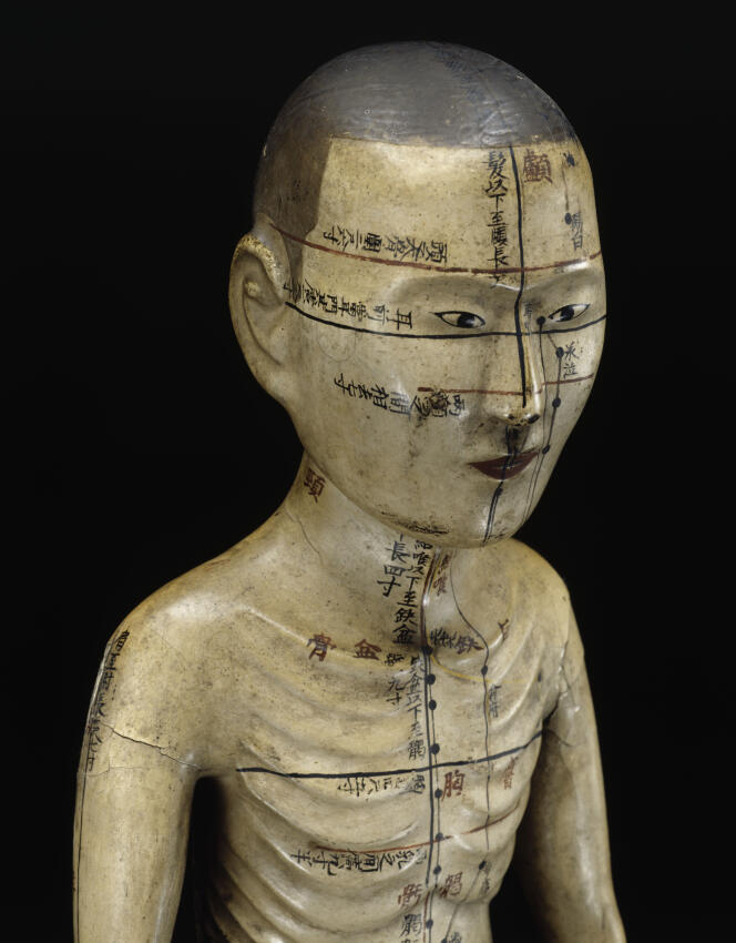 Boiled, lacquered and painted cardboard acupuncture mannequin, China, 18th century.