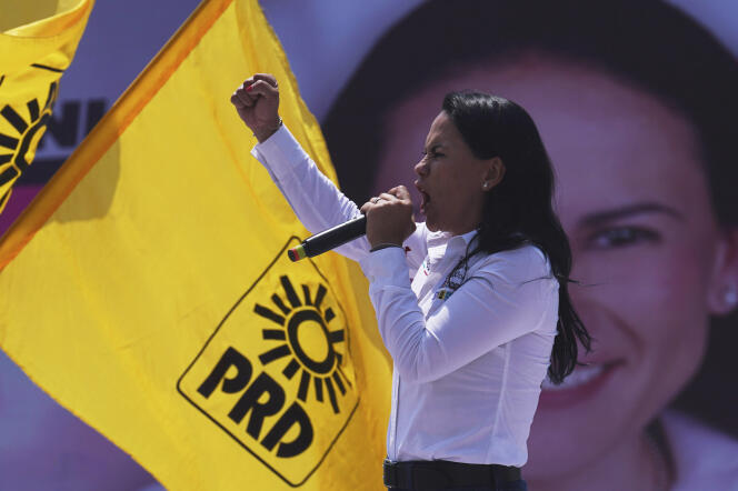 Alejandra del Moral, candidate for governor of the State of Mexico with the PRI-PAN-PRD coalition, campaigns in Nezahualcoyotl, Mexico on May 27, 2023.