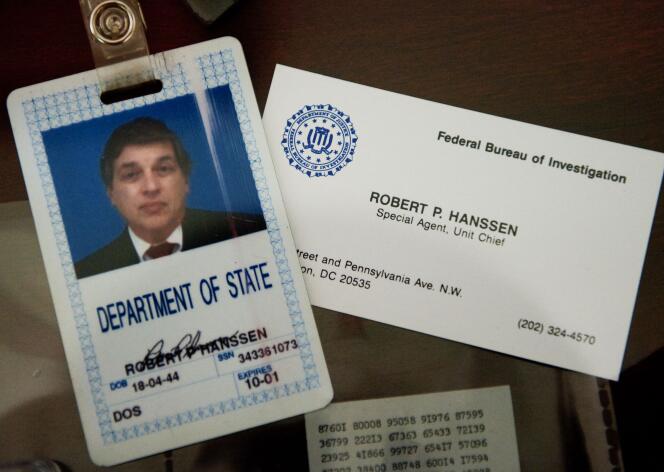 Former FBI agent Robert Hanson's identification badge and business card.