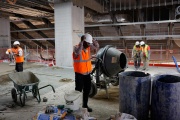 Des ouvriers travaillent sur le site de la station de métro du Grand Paris Express, Saint-Denis Pleyel, à Saint-Denis, le 30 mai 2023.