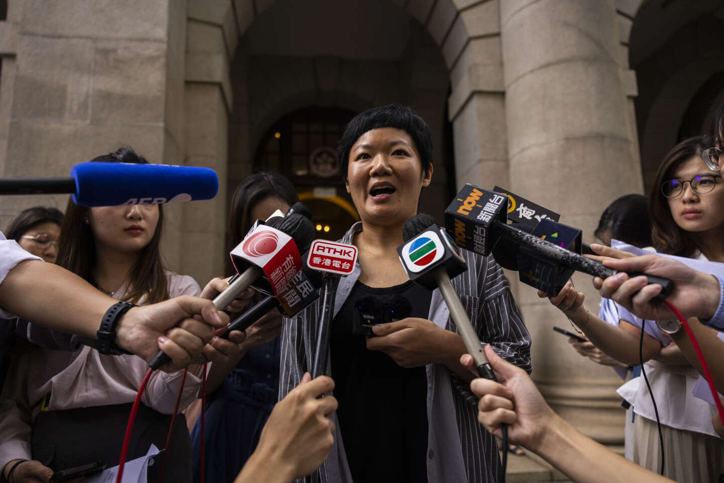 The Hong Kong High Court overturns the investigative journalist’s conviction