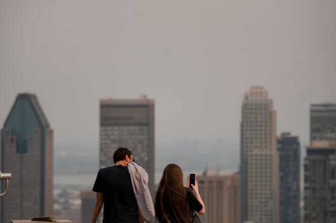 Smoke from the wildfires that have been raging across Canada since early May can be seen from the heights of Mount Royal Park on June 5, 2023 in Montreal, Quebec. 