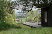 La vue sur l’Allgaü depuis la terrasse en bois de la maison d’hôte Rosso.