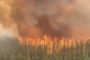 An aerial view shows West Kiskatinaw River wildfire in British Columbia, Canada, June 9, 2023 in this screen grab obtained from a social media video.