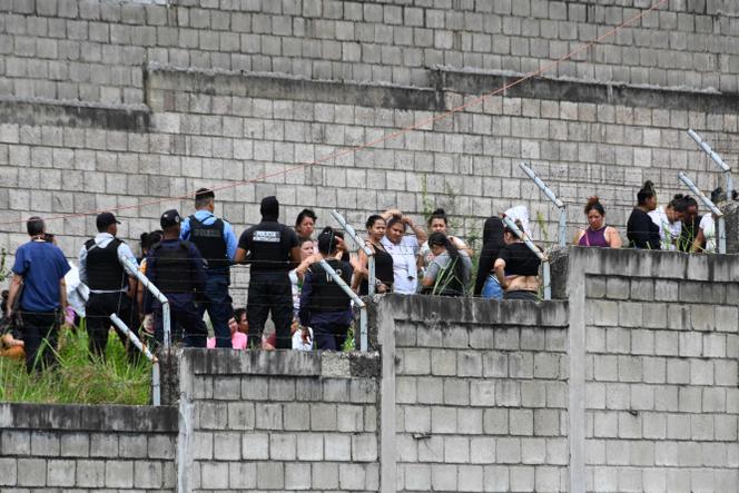 Prison guards observe inmates at the Women's Center for Social Adaptation after a fight between inmates in Tamara, Honduras, June 20, 2023.
