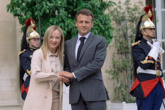 The President of the Italian Council, Giorgia Meloni, is welcomed at the Elysee Palace by Emmanuel Macron, June 20, 2023.
