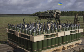 FILE - Ammunition are placed as Ukrainian soldiers take part in a military exercise at a military training camp in an undisclosed location in England, on March 24, 2023. When Russia invaded Ukraine in February 2022, Ukraine’s military was largely reliant on Soviet-era weaponry. While that arsenal helped Ukraine fend off an assault on the capital of Kyiv and prevent a total rout in the early weeks of the war, billions of dollars in military assistance has since poured into the country, including more modern Western-made weapons. (AP Photo/Kin Cheung, File)