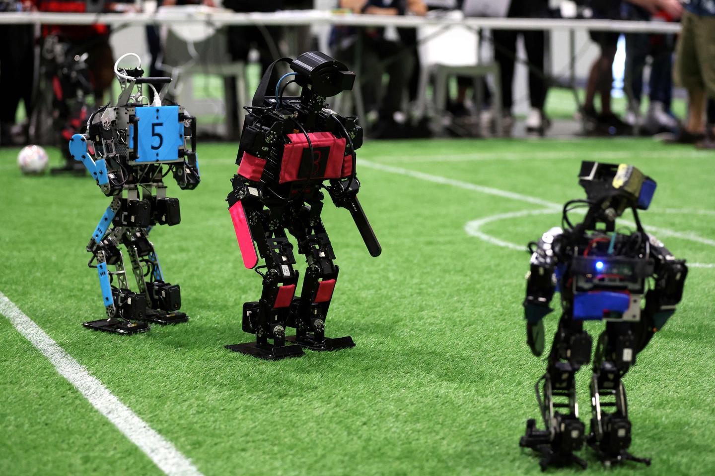 Robots play football matches during the RoboCup Time News