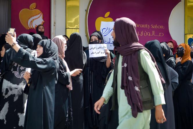Afghan women demonstrate against the closure of beauty salons in Kabul on July 19.
