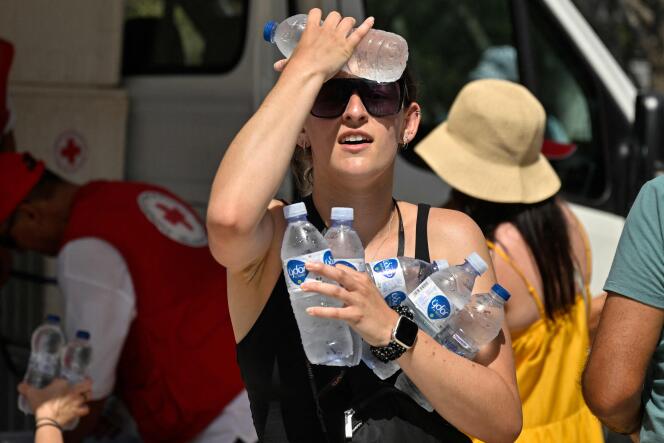 Water bottles distributed by the Red Cross, near the entrance to the Acropolis archaeological site, in Athens, on July 20, 2023.