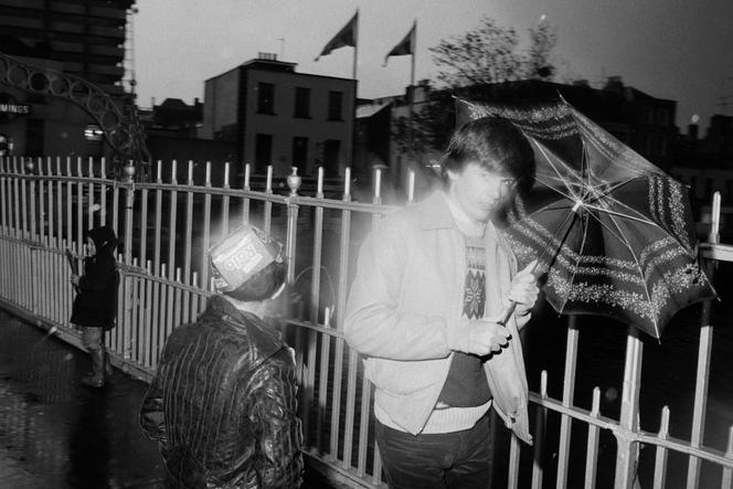 'Ireland. Dublin. Halfpenny Bridge. October, 1981,' photo from the book 'Bad Weather,' by Martin Parr (Zwemmer, 1982).