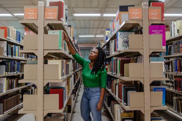 Layla Vitorio Peçanha at the Manguinhos Library of the Oswaldo Cruz Foundation, where she studies, in Rio de Janeiro, July 21, 2023.