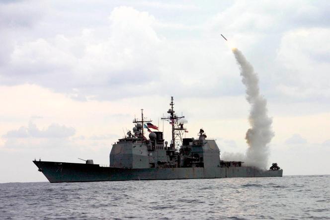 A Tomahawk Land Attack Missile (TLAM) launches from the guided missile cruiser USS Cape St. George (CG 71), in operation in the Mediterranean Sea, on March 23, 2003. 