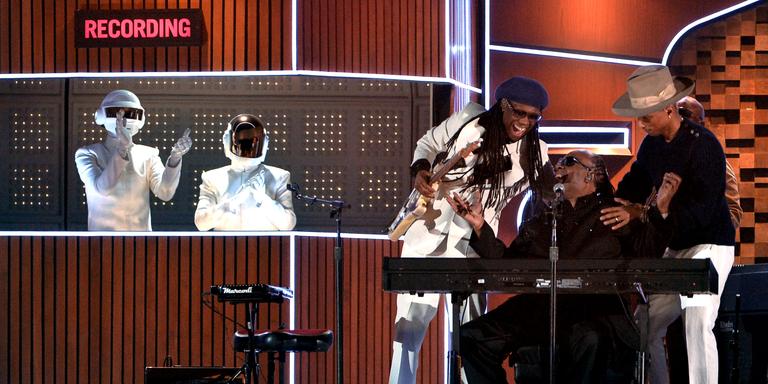 Kevin Winter / WireImage LOS ANGELES, CA - JANUARY 26: (L-R) Musicians Daft Punk, Nile Rodgers, Stevie Wonder and Pharrell Williams perform onstage during the 56th GRAMMY Awards at Staples Center on January 26, 2014 in Los Angeles, California. (Photo by Kevin Winter/WireImage)