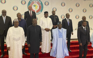 Nigeria President, Bola Ahmed Tinubu, second from left, poses , for a group photograph with other West Africa leaders after a meeting in Abuja Nigeria, Sunday, July 30, 2023. At an emergency meeting Sunday in Abuja, Nigeria, the West African bloc known as ECOWAS said that it was suspending relations with Niger, and authorized the use of force if President Mohamed Bazoum is not reinstated within a week. The African Union has issued a 15-day ultimatum to the junta in Niger to reinstall the democratically elected government. (AP Photo/Chinedu Asadu)