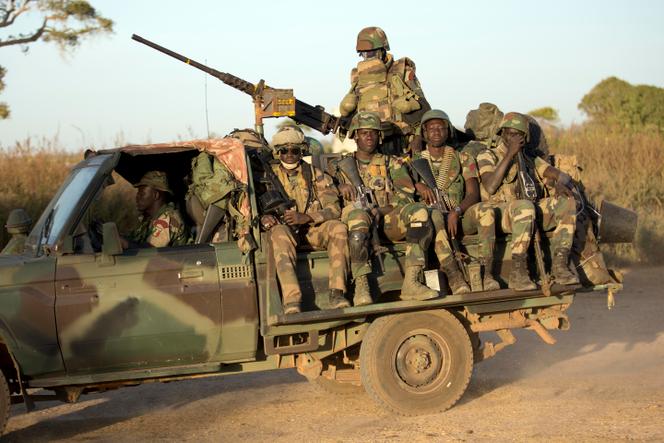ECOWAS Senegalese troops hold their position in Barra, across from the Gambian capital Banjul Jan. 22, 2017.