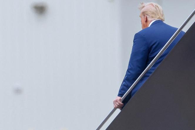 Former American president Donald Trump arrives at Ronald Reagan Washington National Airport on August 3, 2023.
