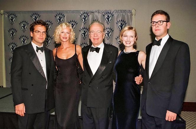 News Corporation chairman and chief executive Rupert Murdoch and sons, including Lachlan (far left) pose together as they arrive November 7 in Beverly Hills for a gala benefit for the Fulfillment Fund. 