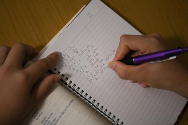 Ngo Gia Khanh, a 22 year old from Vietnam, is studying Japanese at an NGO supporting foreign workers in Tokyo, on June 9, 2023. 