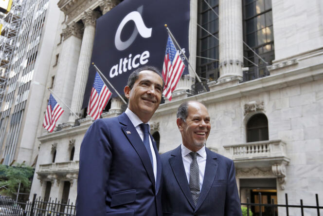 Los cofundadores de Altice, Patrick Drahi (izquierda) y Armando Pereira, en la salida a bolsa del grupo de telecomunicaciones en la Bolsa de Valores de Nueva York el 22 de junio de 2017.