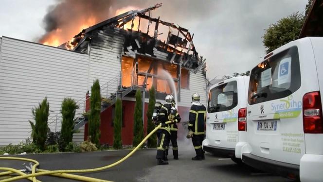 Firefighters try to contain the blaze at a vacation home in the town of Wintzenheim, northeastern France, on August 9, 2023.