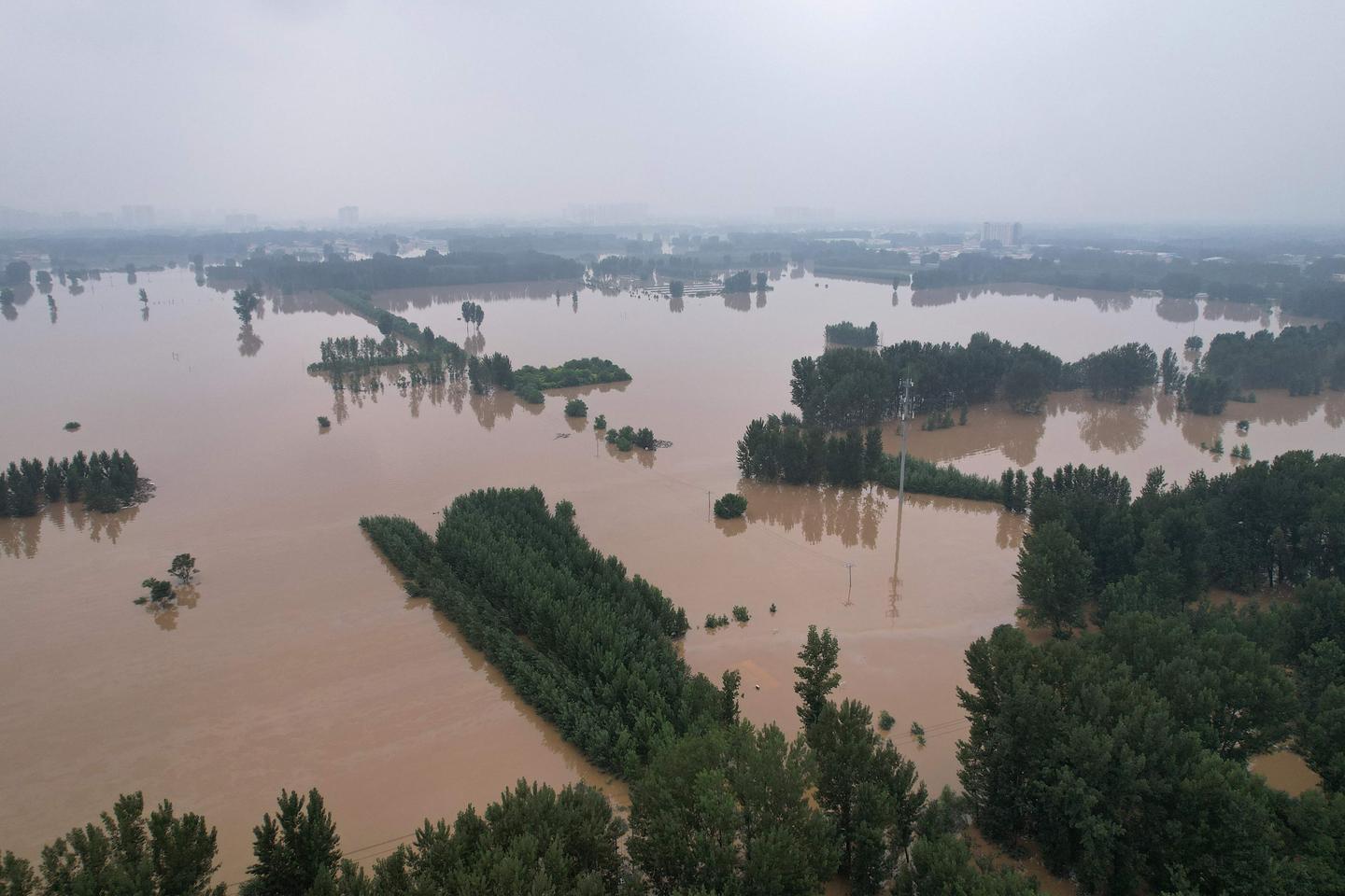 China Flood victims in 'sacrificed' areas remain bitter