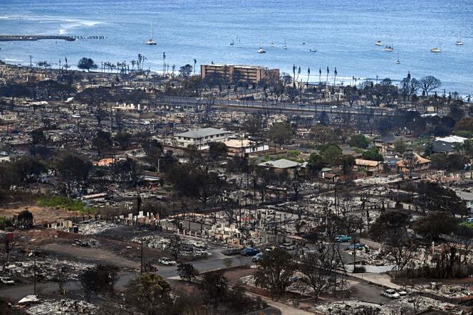 An aerial image taken on August 10, 2023, shows destroyed homes and buildings burned to the ground in Lahaina in the aftermath of wildfires in western Maui, Hawaii.