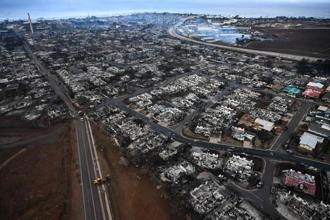 An aerial image taken on August 10, 2023, shows destroyed homes and buildings burned to the ground in Lahaina in the aftermath of wildfires in western Maui, Hawaii.