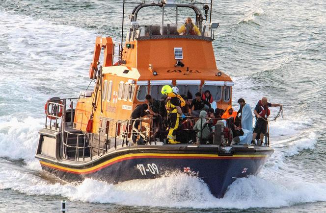 Migrants rescued at sea by the Royal National Lifeboat Institution, a British charity, arrive in Dover (UK) after attempting to cross the English Channel, August 12, 2023.