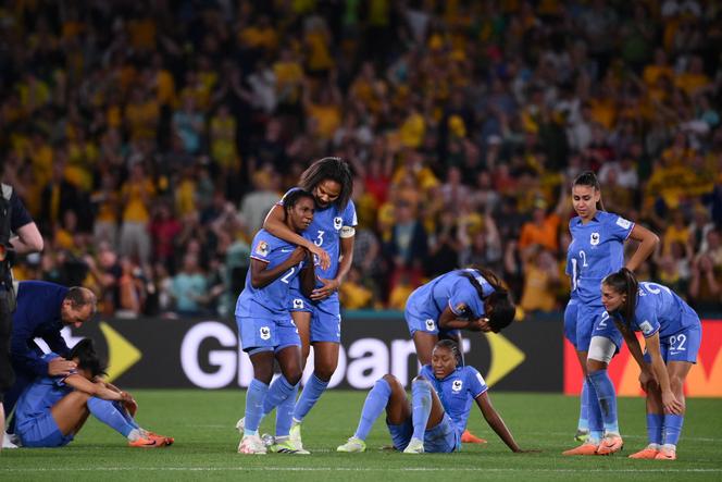 France players react after the shoot-out.