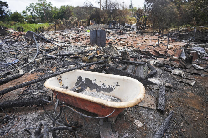 A bathtub sits amid the debris of a burned house in Kula, Hawaii, U.S., on August 14, 2023.